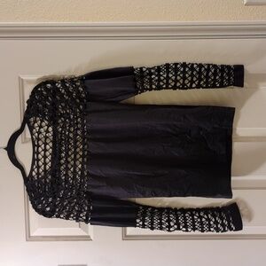Venus, black women's size large cut out top long sleeve. Never worn
